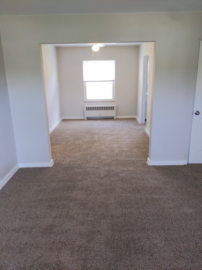 Living room looking into dining room - 1224 North Plum Street