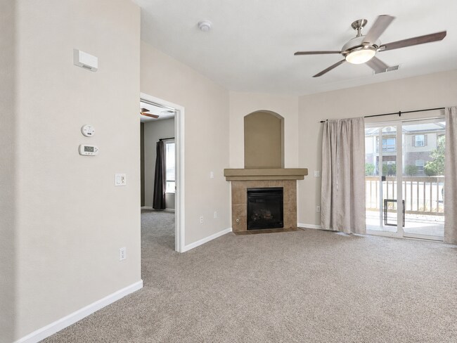 Building Photo - Spacious 2-Bedroom Condo with Garage, Fireplace, Pool & Most Included Utilities