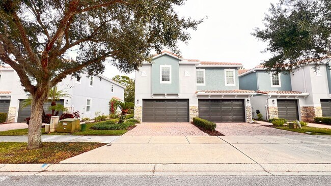 Building Photo - Live Bright in Oviedo – Gated Townhome with Style, Space & Serenity! WASHER & DRYER INCLUDED!