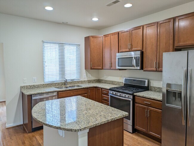 Foto del edificio - Brambleton Elegance: A Spacious Townhome Oasis