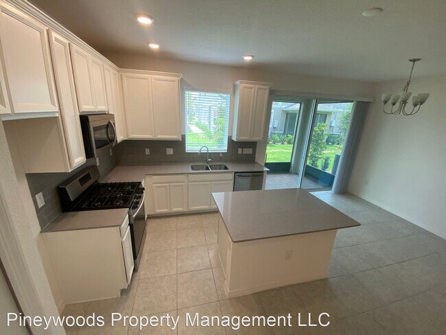 Foto del edificio - 3 br, 2.5 bath House - 5749 Spotted Harrie...