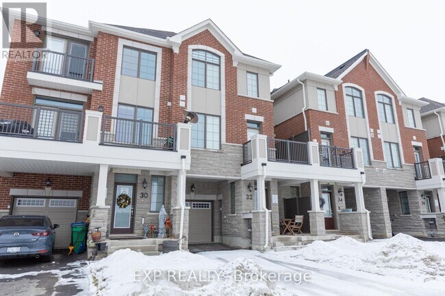 Photo du bâtiment - 32 Elmer Moss Ave