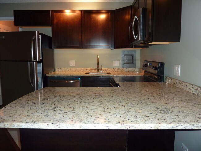 Building Photo - Premium One-Bedroom Condo Near UTK – Walk ...