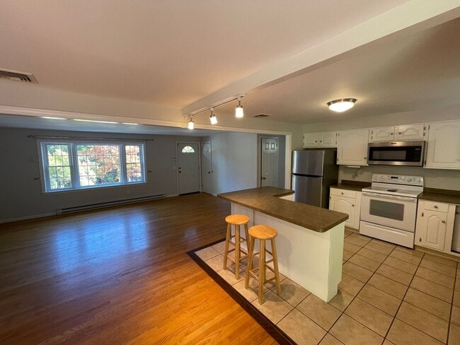 Building Photo - Beautiful 4 Bedroom House *w/ an In-Law* in Cheshire! Garage Parking, Central Air, & a Beautiful ...