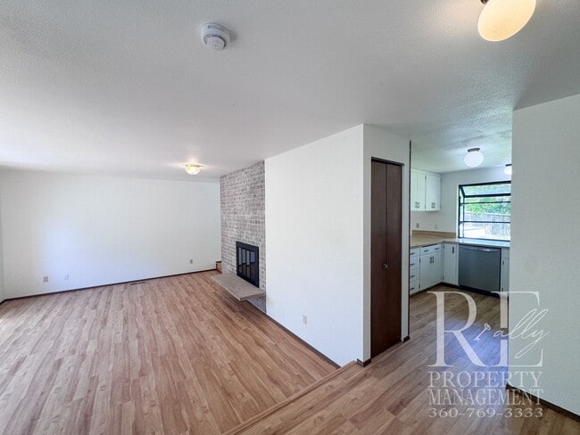 Building Photo - Spacious Poulsbo Home with Large Basement, Fenced Yard & Garden Space