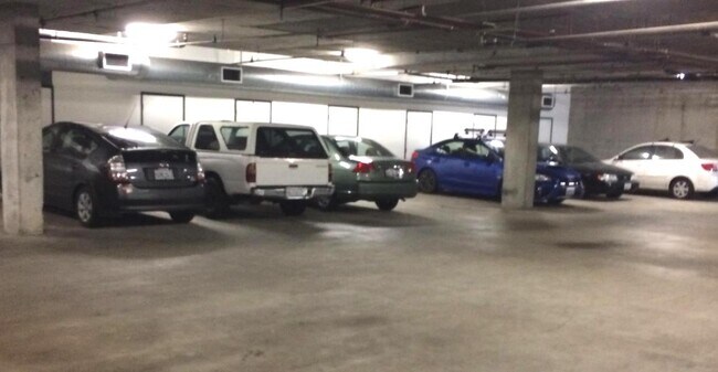 Secure parking space and storage unit included in rental - 469 Clementina Street