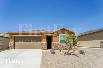 Building Photo - 7875 N Scholes Ave