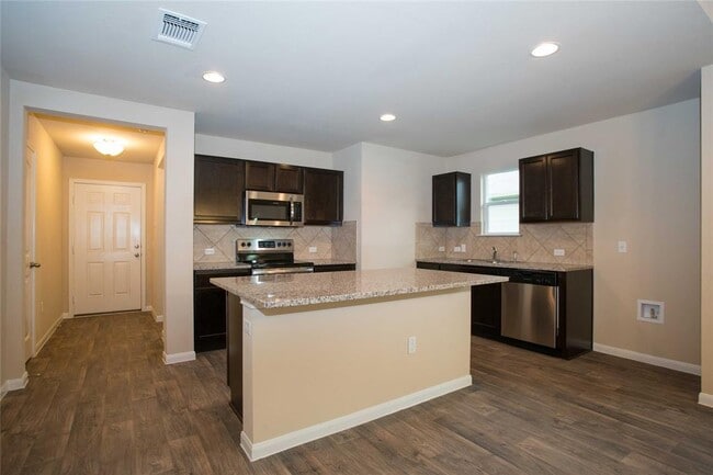 Building Photo - 708 Comal Run
