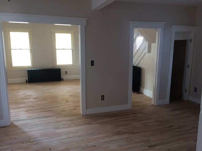 Dining room looking into living room. - 1027 Sewall Ave