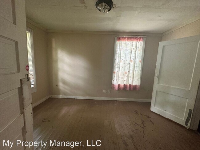 Building Photo - 3 br, 1 bath House - 311 W. 69th Street