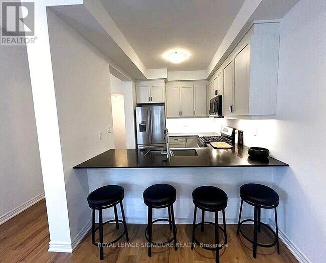 Photo du bâtiment - 575 Woodward Ave