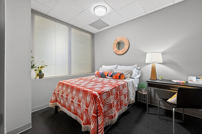 Cozy Carpeted A4 Bedroom at University Plaza NIU Off-Campus Apartments - University Plaza Apartments
