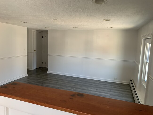 living room facing entrance - 1 N Franklin St