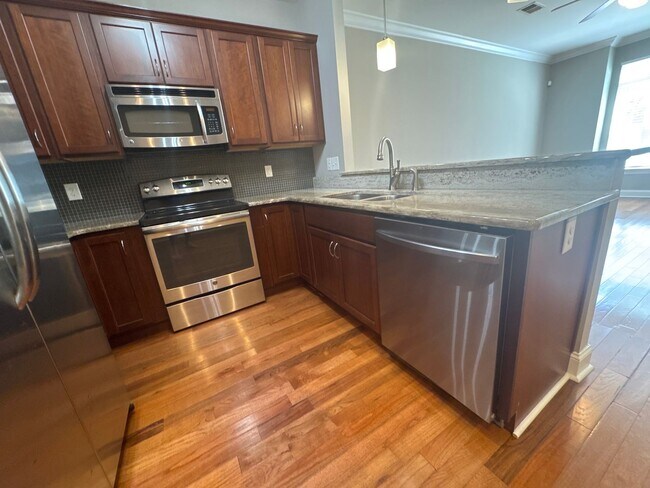 Building Photo - Modern Townhome Just Minutes from Downtown...