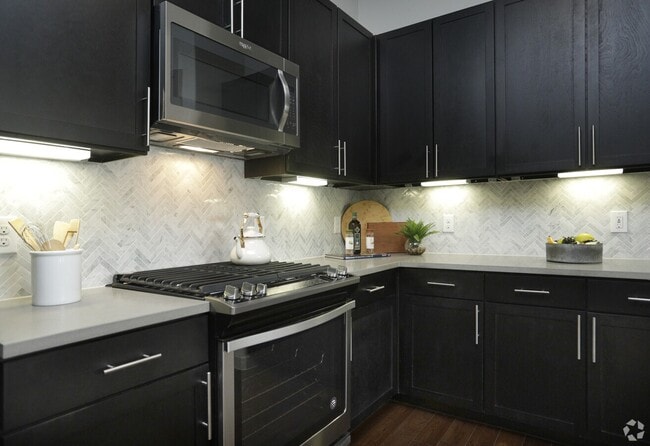 Building Photo - Elevate Your Everyday in the City