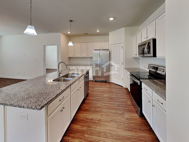 Foto del edificio - 7068 Creeksong Dr
