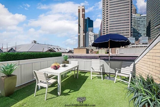 Foto del edificio - 136 Beekman St