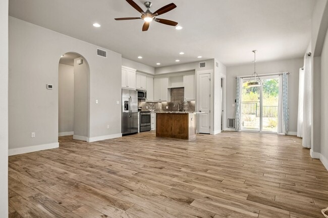 Building Photo - Like New Condo Within Walking Distance to ...