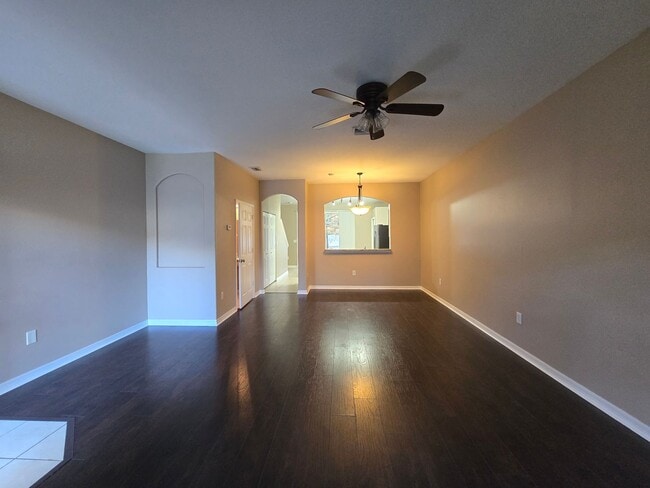 Building Photo - Great Town Home in Gated Community with Pool and Pond View