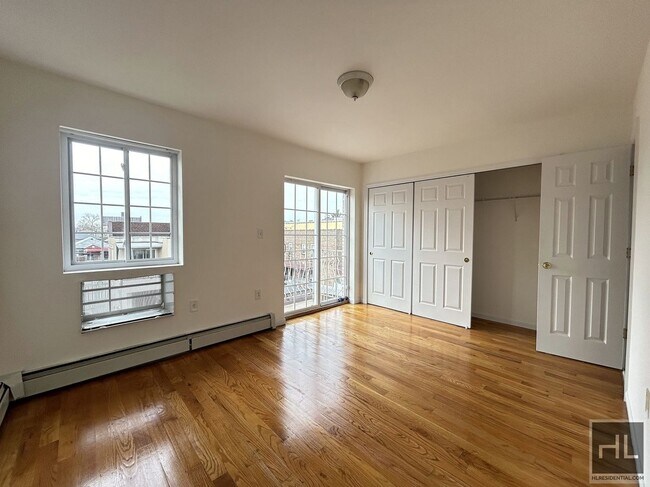 Building Photo - 3BR/2BA with TWO BALCONIES & Great Closet ...