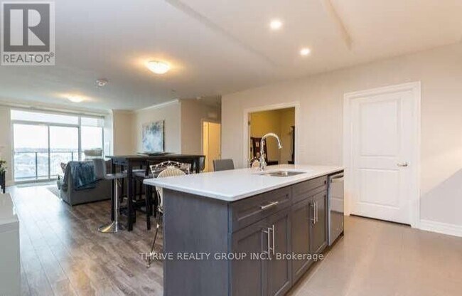 Photo du bâtiment - 260 Villagewalk Blvd