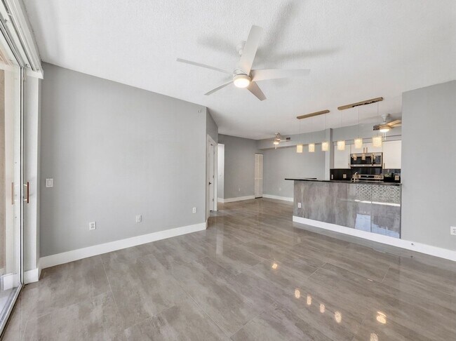 Building Photo - Completely remodeled first-floor condo in one of North Naples