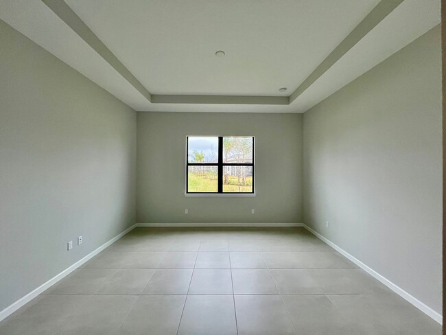 Building Photo - VERANDA GARDENS BRAND NEW HOME