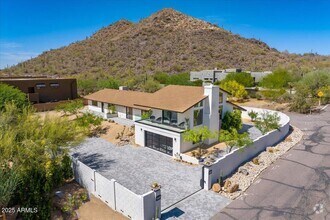Building Photo - 5801 E Surrey Dr