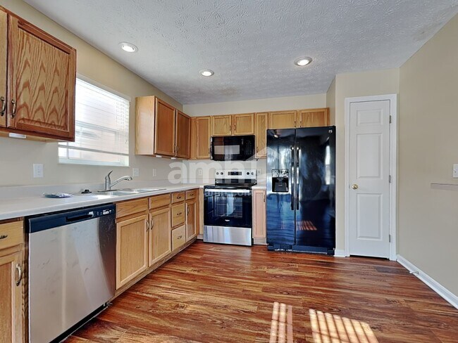 Foto del edificio - 6124 Pine Meadows Dr