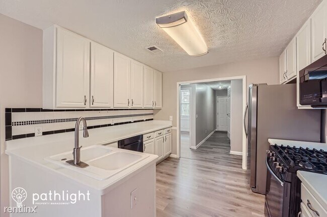 Foto del edificio - 4 br, 2 bath House - 2002 Flowering Dr UNIT