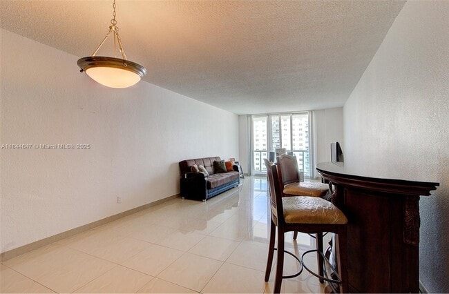 Building Photo - 19380 Collins Ave