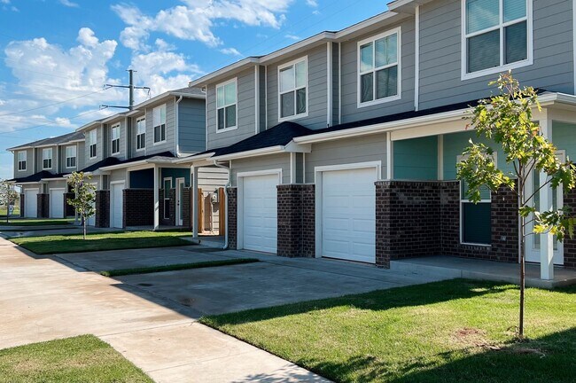 Building Photo - SPECIAL OFFER!! Modern. Efficient. Move-In...