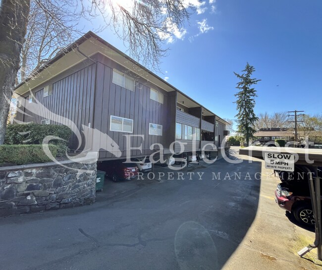 Building Photo - Convenient 2 Bedroom 2 Bathroom Condo Living "In The Trees" with On-Site Amenities