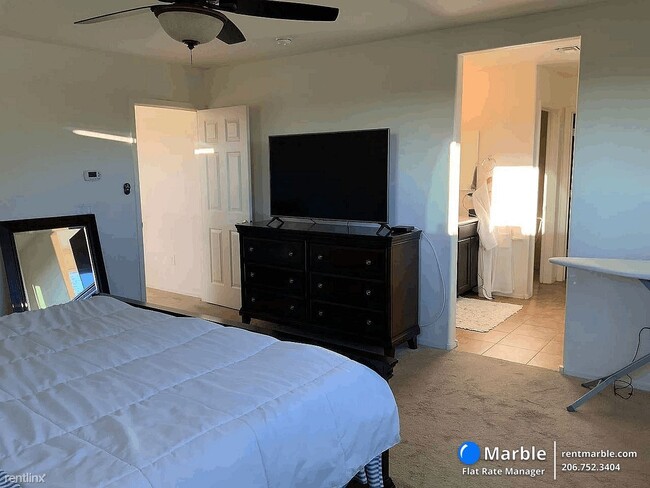 Building Photo - 4 br, 2.5 bath House - 476 E Channel View Pl