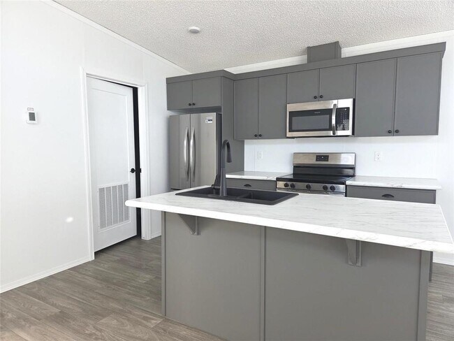 Photo du bâtiment - 61 Prairie Oak Dr