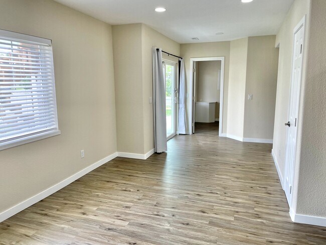 Lots of natural light with big windows and sliding door - 12838 Arezzo Cir