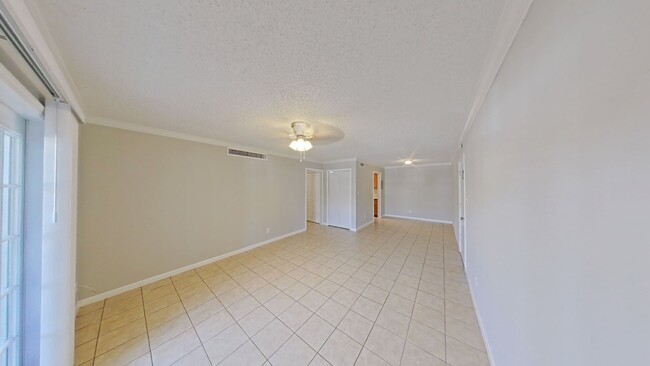 Building Photo - Spacious 2-Bed, 2-Bath Ground-Floor Condo ...