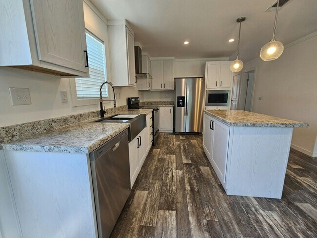 Foto del edificio - 6700 Hidden Oaks Dr