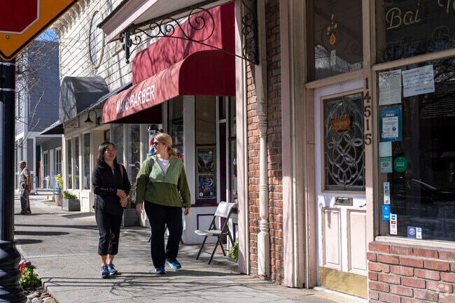 Locals are walking around in downtown Saratoga.