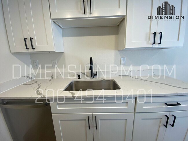 Foto del edificio - Bright & Comfortable 2-Bed, 1-Bath Condo –...