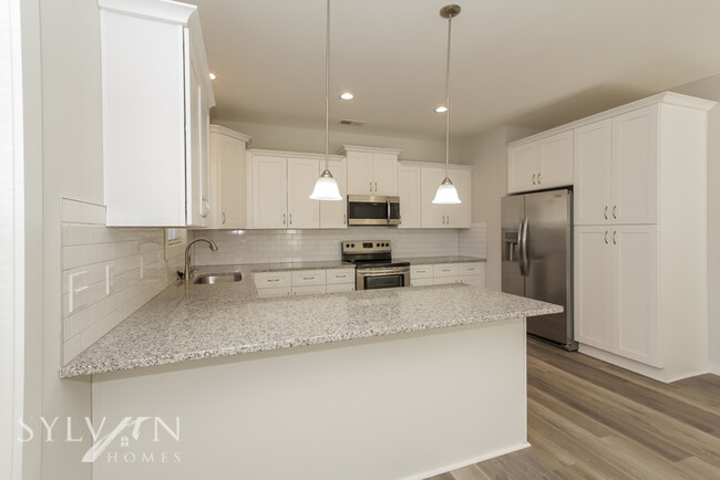 Building Photo - The living is easy in this 3 bedroom, 2,5 ...