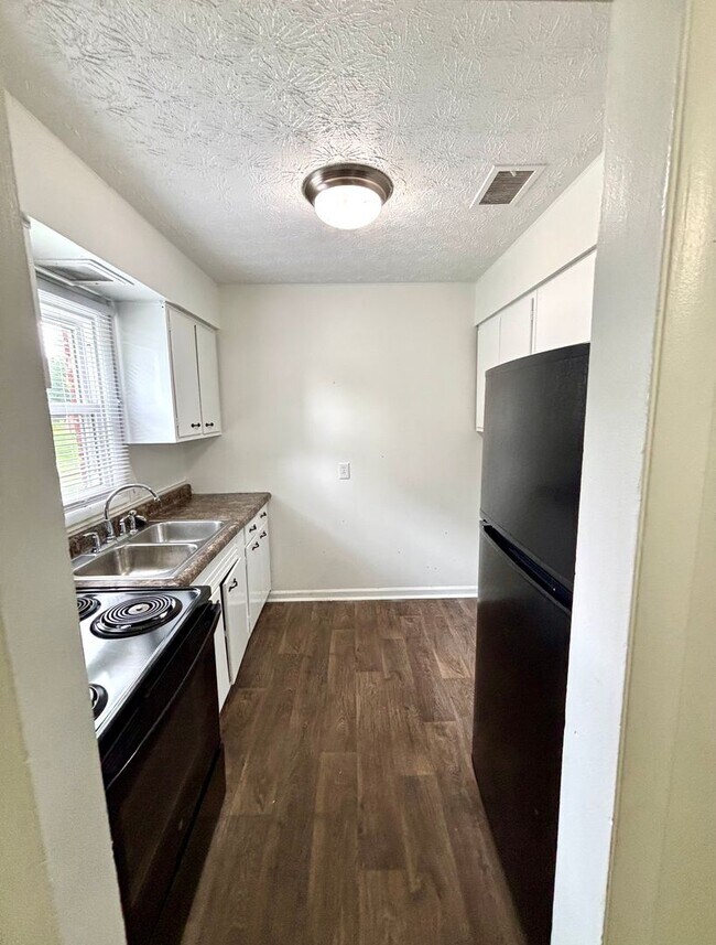 Foto del edificio - 7110-7112 Pin Oak Dr
