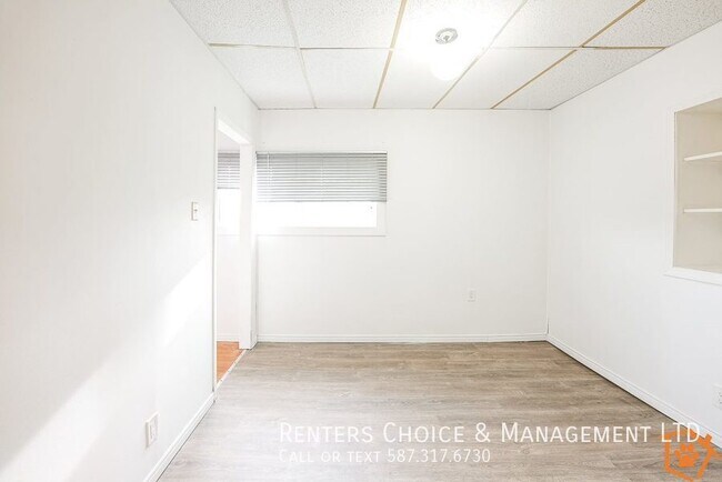 Photo du bâtiment - Cat-Friendly Downtown Taber Apartment with Laundry Access
