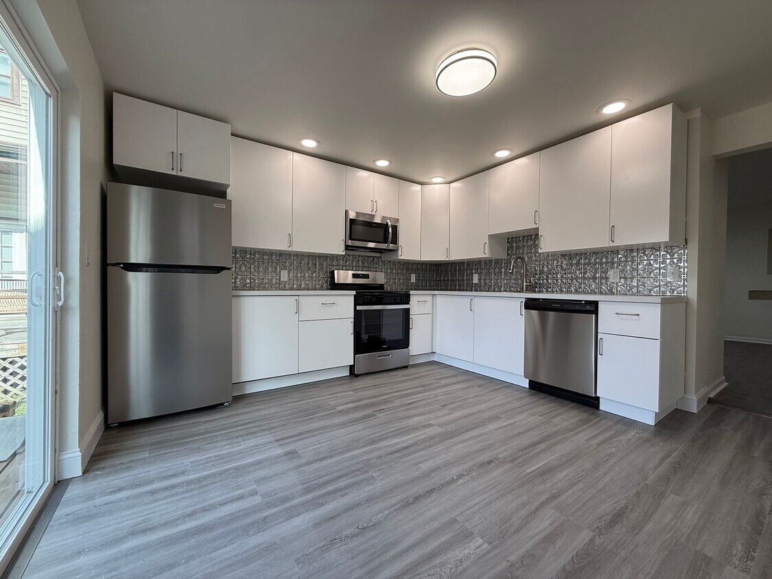 Updated 4BR / 2 Bath Home with off-street parking! - Updated 4BR / 2 Bath Home with off-street parking!