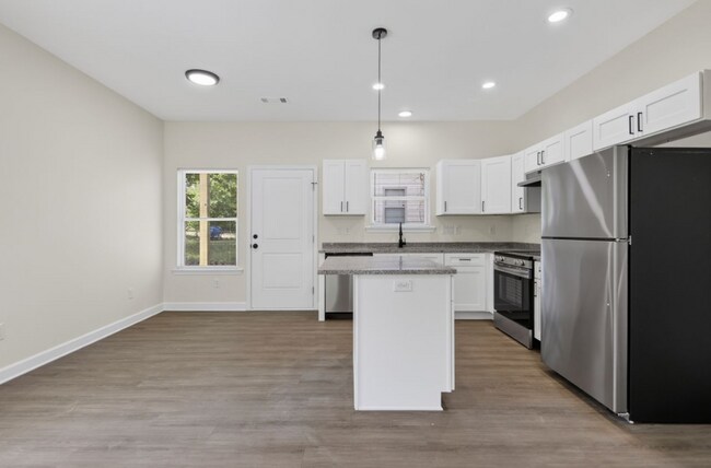 Building Photo - Inviting Home with Bright Interiors & Ceiling Fans Throughout - Comfortable Rental with Everyday ...