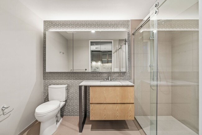 Building Photo - Modern Studio with Partial Ocean Views at ...
