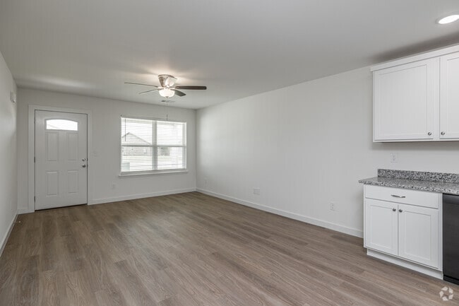 3 habitaciones, 2 baños - 1192 pies cuadrados - Sala de estar - Mason Valley Townhomes