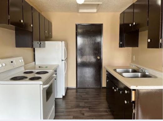 Photo du bâtiment - 3 Bed 1.5 Bath Unit in Olds, AB