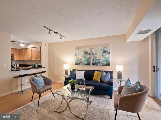 Living room - overhead light has been updated! - 7500 Woodmont Ave