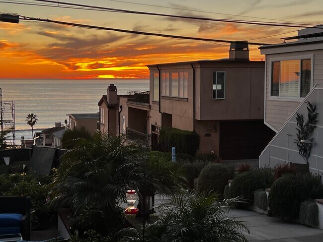 sunset from our walkstreett - 323 31st Pl